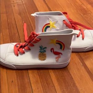 White hand patched high top shoes